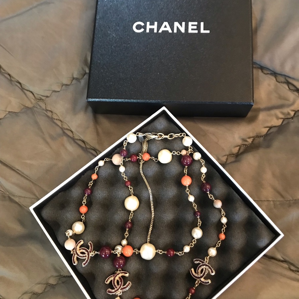 Chanel pearl burgundy n orange necklace.